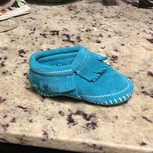 Never worn Baby Minnetonka shoes size 4